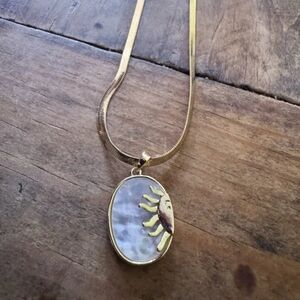 Gold and Silver Sun Pendant Necklace